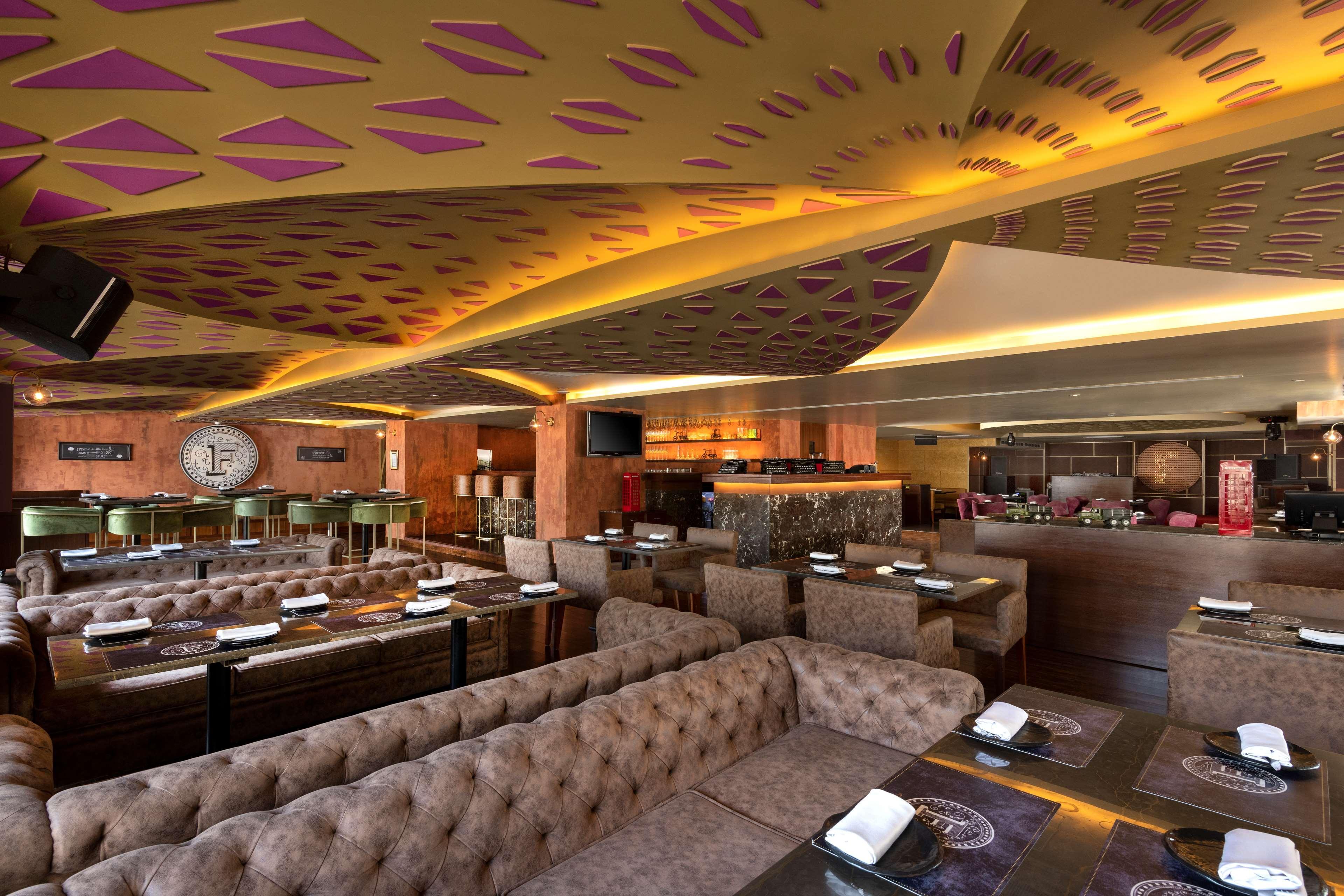 Radisson Jaipur City Center Extérieur photo Interior of the restaurant